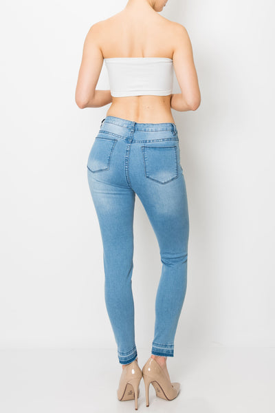 Light Wash Released Hem Skinny Jeans